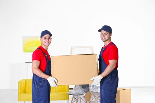 Home removals team navigating a Brockley street