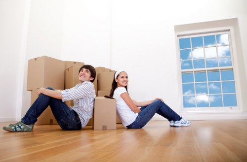 Local removals team handling furniture in Brockley