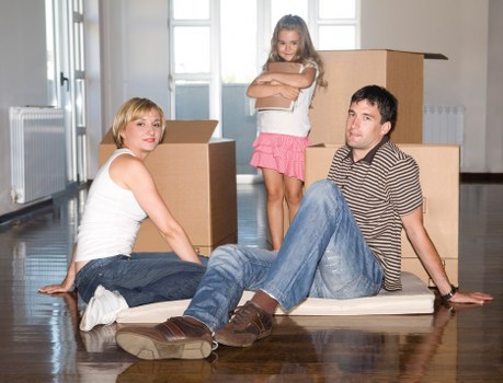 Trained moving team handling furniture with care